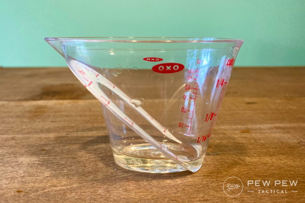 A small amount of water in a measuring cup